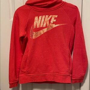 Nike Red Pullover with Logo for Girls Size L. More like an orange red color